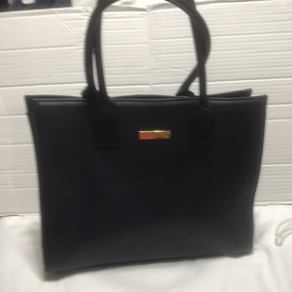 Joy and Iman leather tote with padding for laptop. NWOT